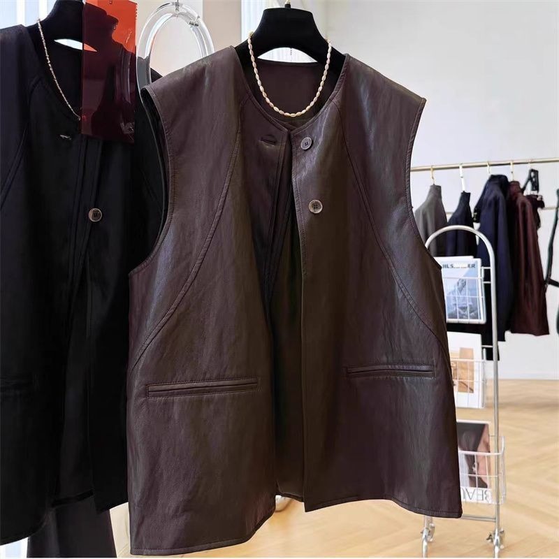 Zwart leren mouwloos jasje, sl - Women'S Fashion Petite recensie en prijs